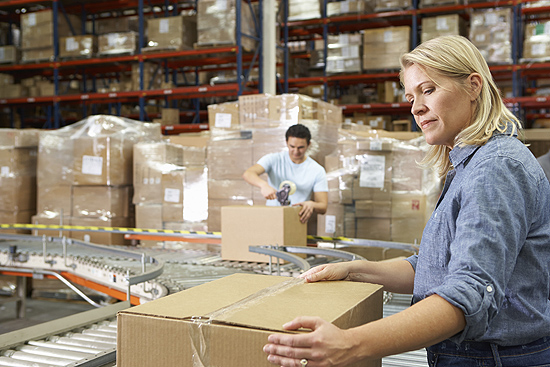 Workers at Packaging Station