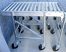 Impact Conveyor with Steel Rollers - 6" Casters - 28"W, Length: 46"
