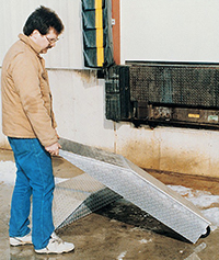 Man moving wheel riser with attached portable wheel