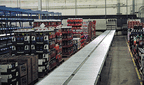 GroceryWorks warehouse with conveyors and storage area
