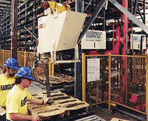 workers near storage area at Hargrove manufacturing facility