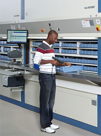 Picking orders from a vertical carousel