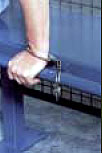 Handcuff rail for bench