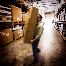 worker carrying boxes